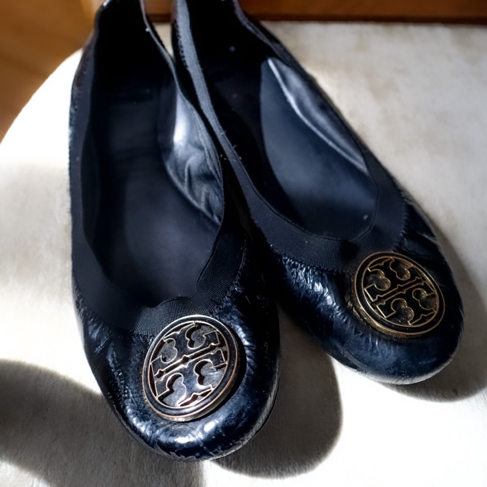 Gently worn Tory Burch black flats, size 8.5